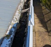 Gutters before cleaning